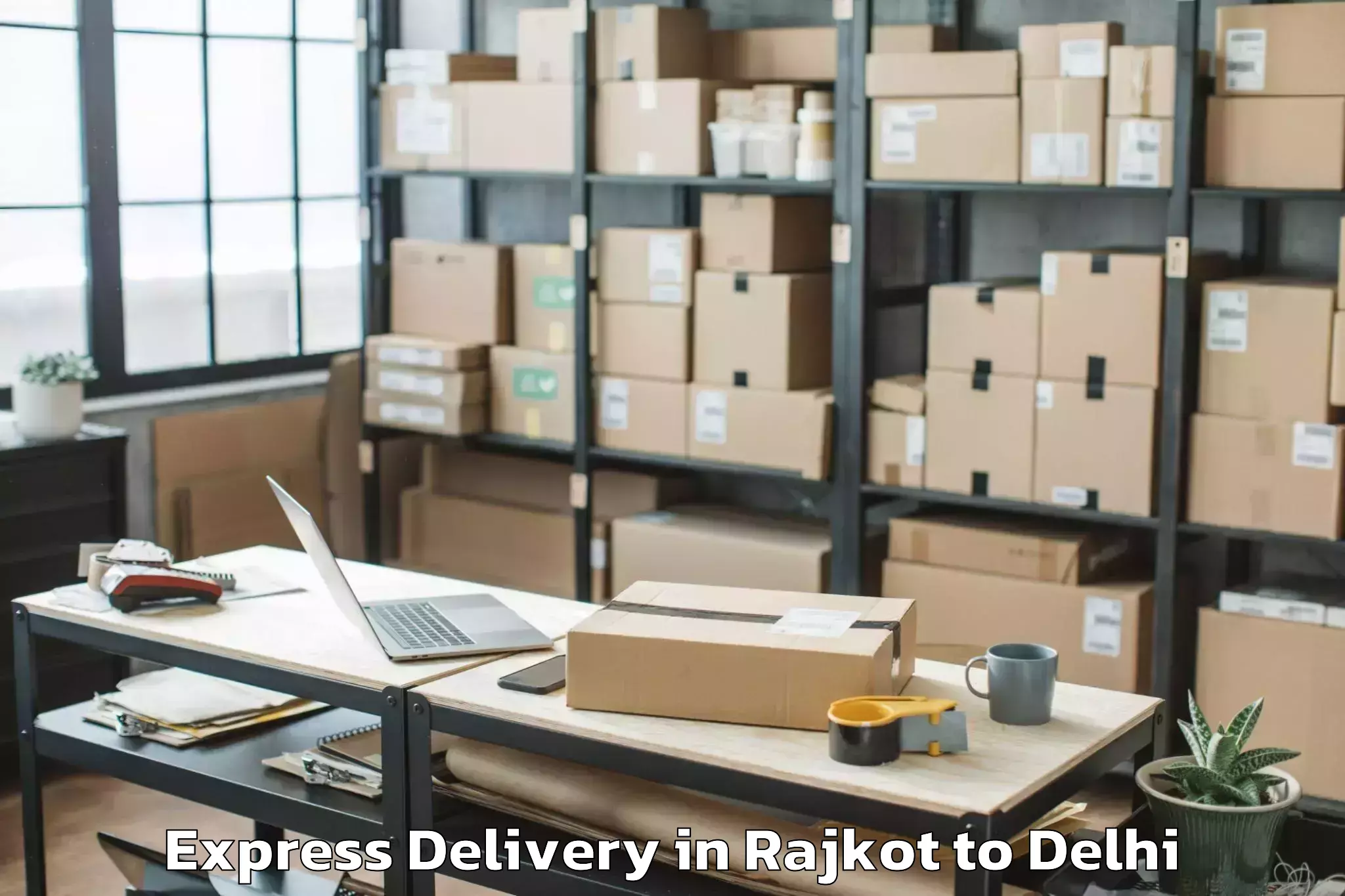 Get Rajkot to Flatted Factory Complex Okhla Express Delivery